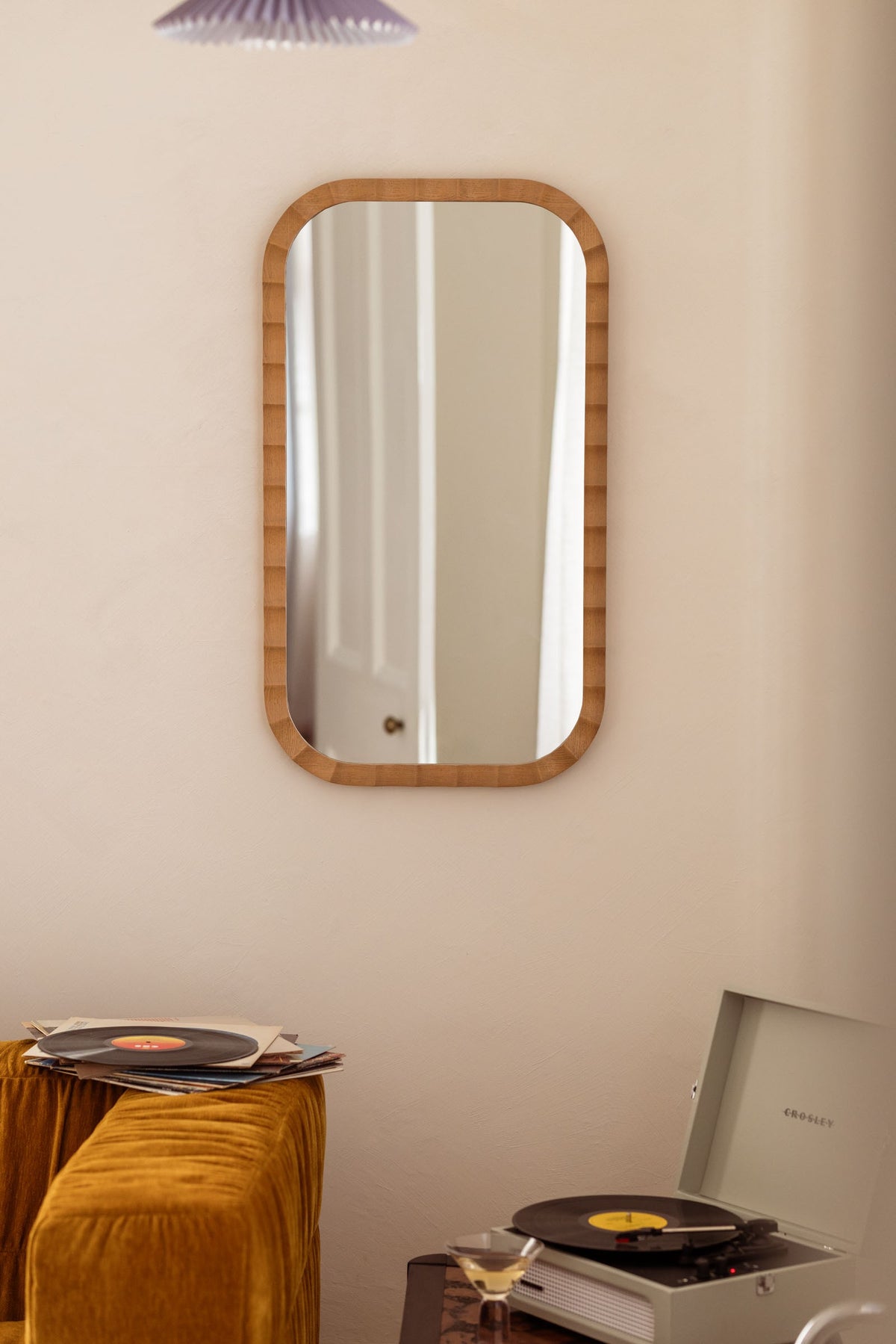Ruffles Mirror in Oak - Insitu